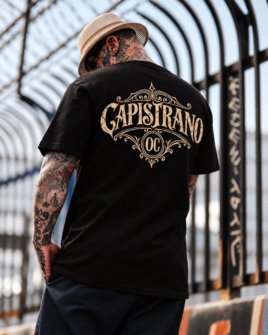 Capistrano OC black tee on model, back view